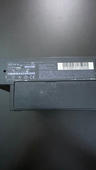 PlayStation 2 con cámara y juegos