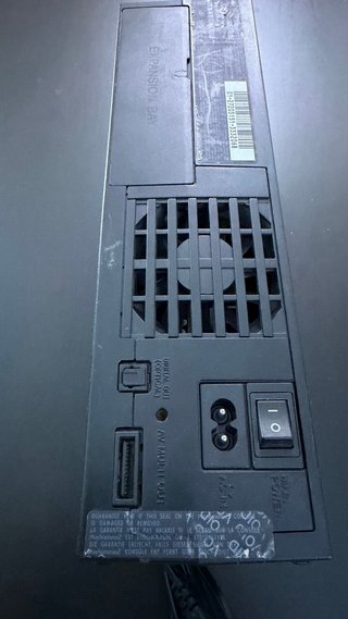 PlayStation 2 con cámara y juegos