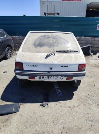 Peugeot 6061 6204a3 faro izquierdo 205 1.1 mt (60