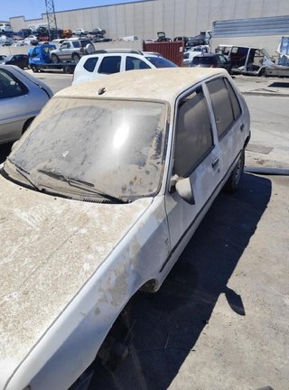 Peugeot 6061 6204a3 faro izquierdo 205 1.1 mt (60