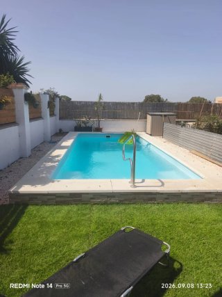 Piscina de poliéster reforzado de 6.70x3m