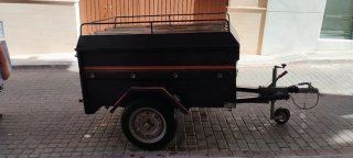 Remolque para coche con rueda de apoyo