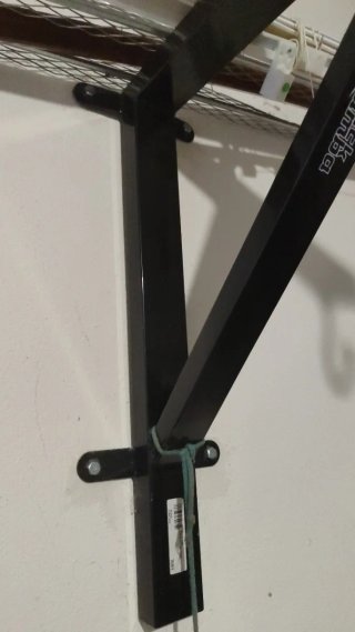 Soporte de pared para saco de boxeo