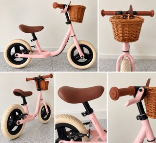Bici de equilibrio rosa con cesta Muy bien cuidada