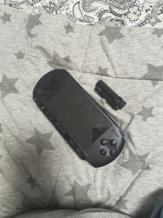 PSP Negra con Phineas y Ferb 2D