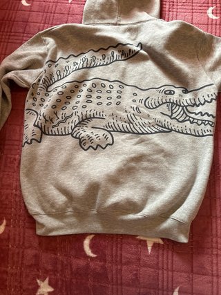 Sudadera gris Lacoste con  capucha y estampado