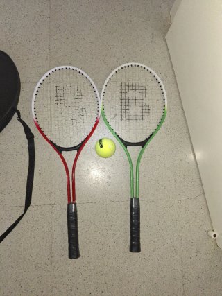 Raquetas de tenis con funda y pelota