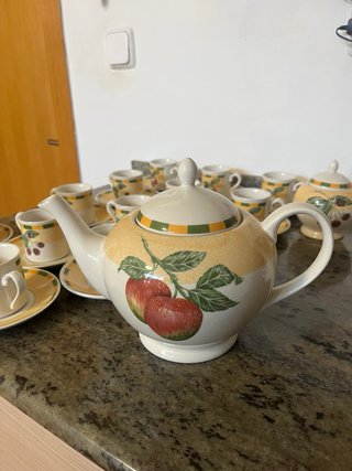 Juego de 12 tazas de café con platillos