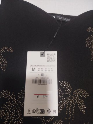 Vestido negro con pedrería talla M