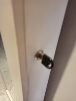 Espejo joyero de madera y cristal de pared