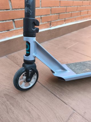 Patinete freestyle color turquesa y gris