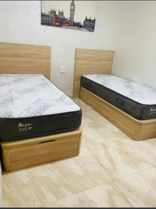 Camas gemelas Naia madera y tela