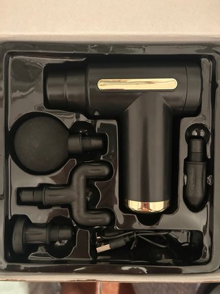 pistola de masaje