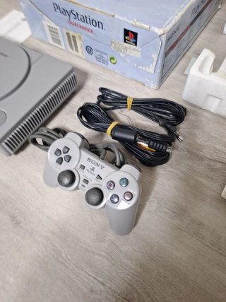PlayStation 1 DualShock gris