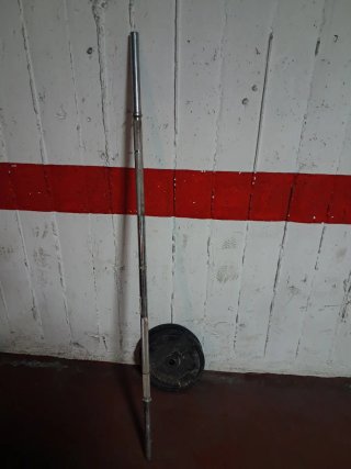 Barra de pesas con discos