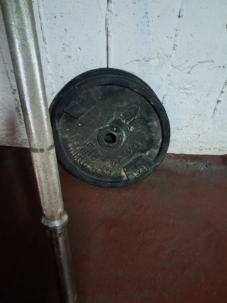 Barra de pesas con discos