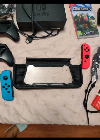 Nintendo Switch + Accessori + Minecraft