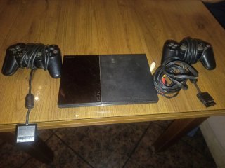 Playstation 2 con 2 mandos