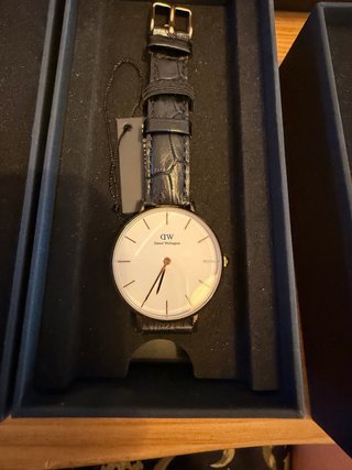 Reloj Daniel Wellington Negro y Dorado + correa