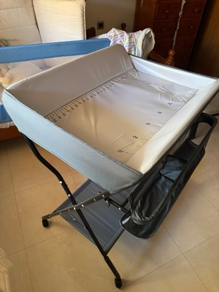 Cambiador de bebé plegable.