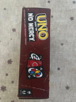 UNO Show 'Em No Mercy Juego de Mesa