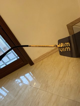 Occhiali Miu Miu neri e oro