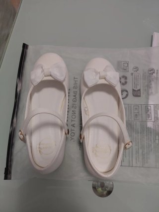 Zapatos blancos niña lazo