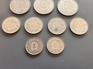 Lote 25 monedas Suiza y Bélgica.
