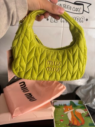 Borsa piccola Miu Miu verde e dorata