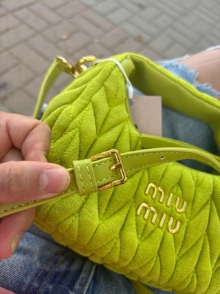 Borsa piccola Miu Miu verde e dorata
