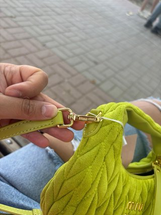 Borsa piccola Miu Miu verde e dorata