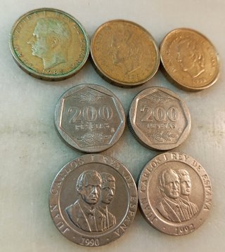 ESPAÑA - Lote de 7 monedas de 100 y 200 pts. JC I