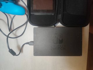 Nintendo Switch + Mando + 4 Juegos