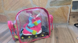 Conjunto de patines, protecciones y mochila