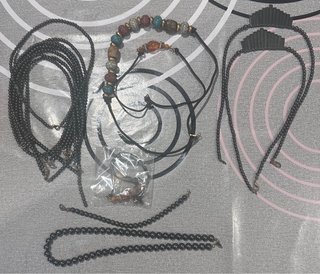 Lote 15 bijoux: collane e bracciali
