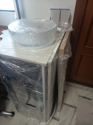 Lavabo de cristal y encimera de madera