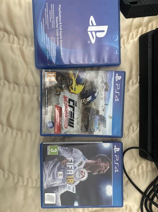 PS4 Slim Nera + 2 Controller + Giochi