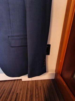 Traje de chaqueta azul juvenil