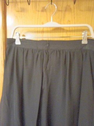 Falda negra asimétrica. Talla más pequeño