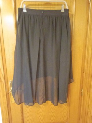 Falda negra asimétrica. Talla más pequeño