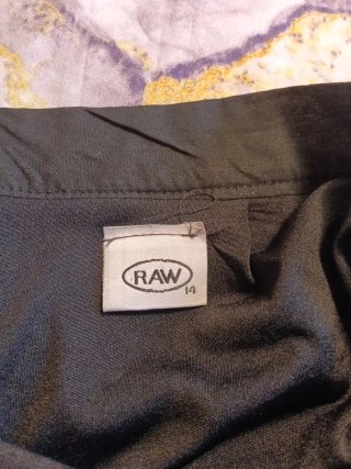 Falda negra asimétrica. Talla más pequeño