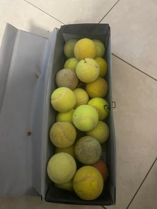 22 pelotas de tenis
