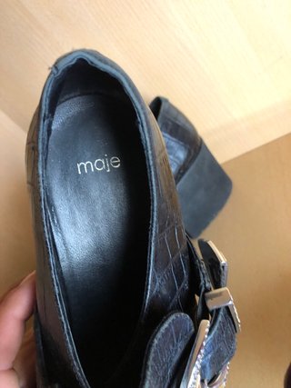 Mocasines Maje negros con hebilla plateada