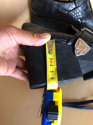 Mocasines Maje negros con hebilla plateada