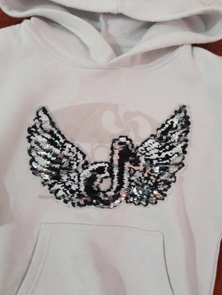 Sudadera niña con alas lentejuelas