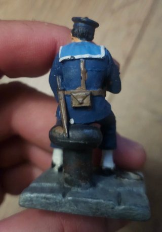 Marinero sentado de plomo