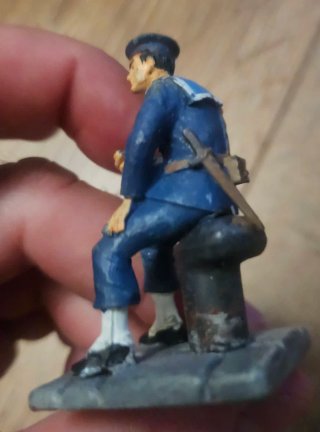 Marinero sentado de plomo