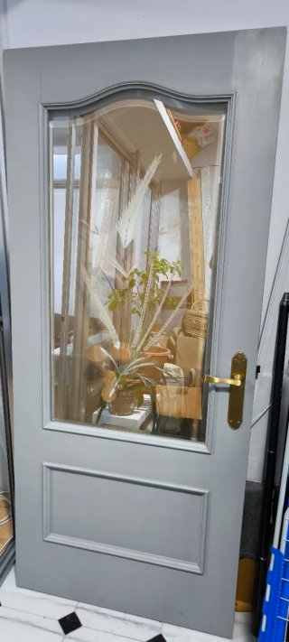 Puerta interior cristal y madera maciza.
