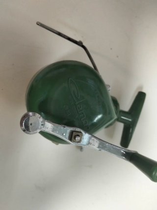 Carrete de pesca vintage verde