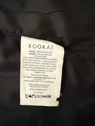 Chaleco blazer largo Kookai negro con cinturón
